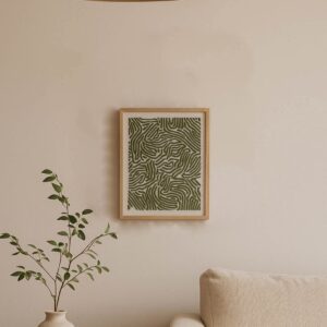 Moss Geometry embroidered painting on a wall